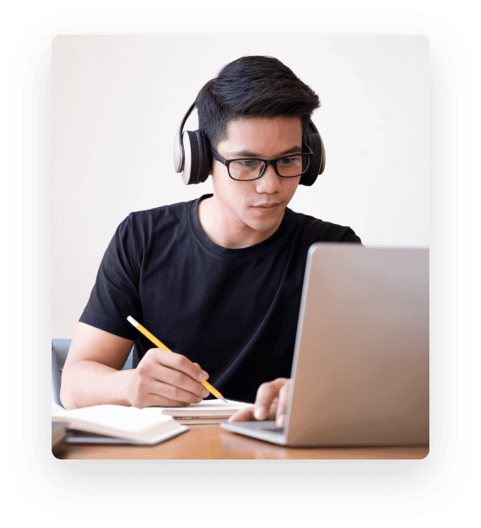 young collage student using computer mobile device studying online education online learning